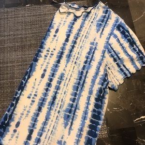 Adorable tie dye shirt/ runs smaller then size/ like a large